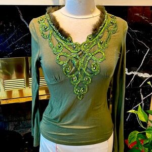 Olive green top with fur trim